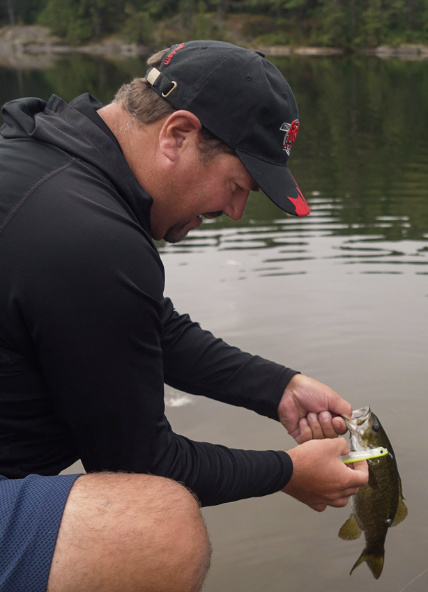 angler fishing smallmouth bass