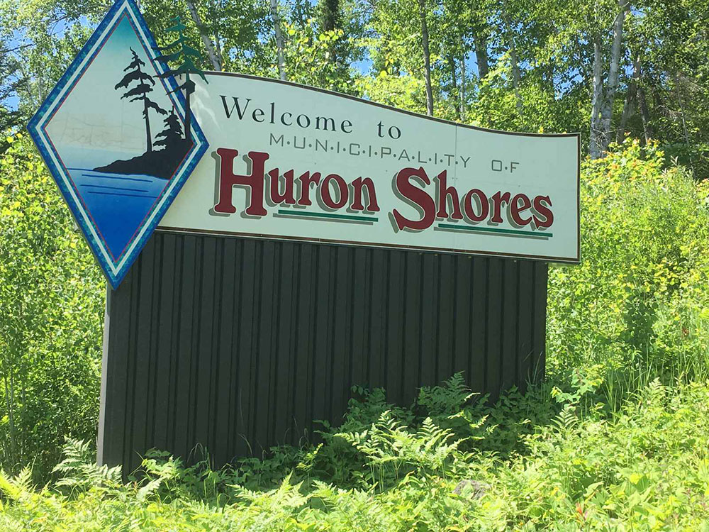 welcome sign to huron shores