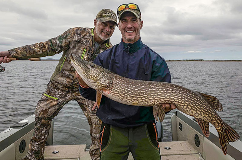 anglers fishing northern pike