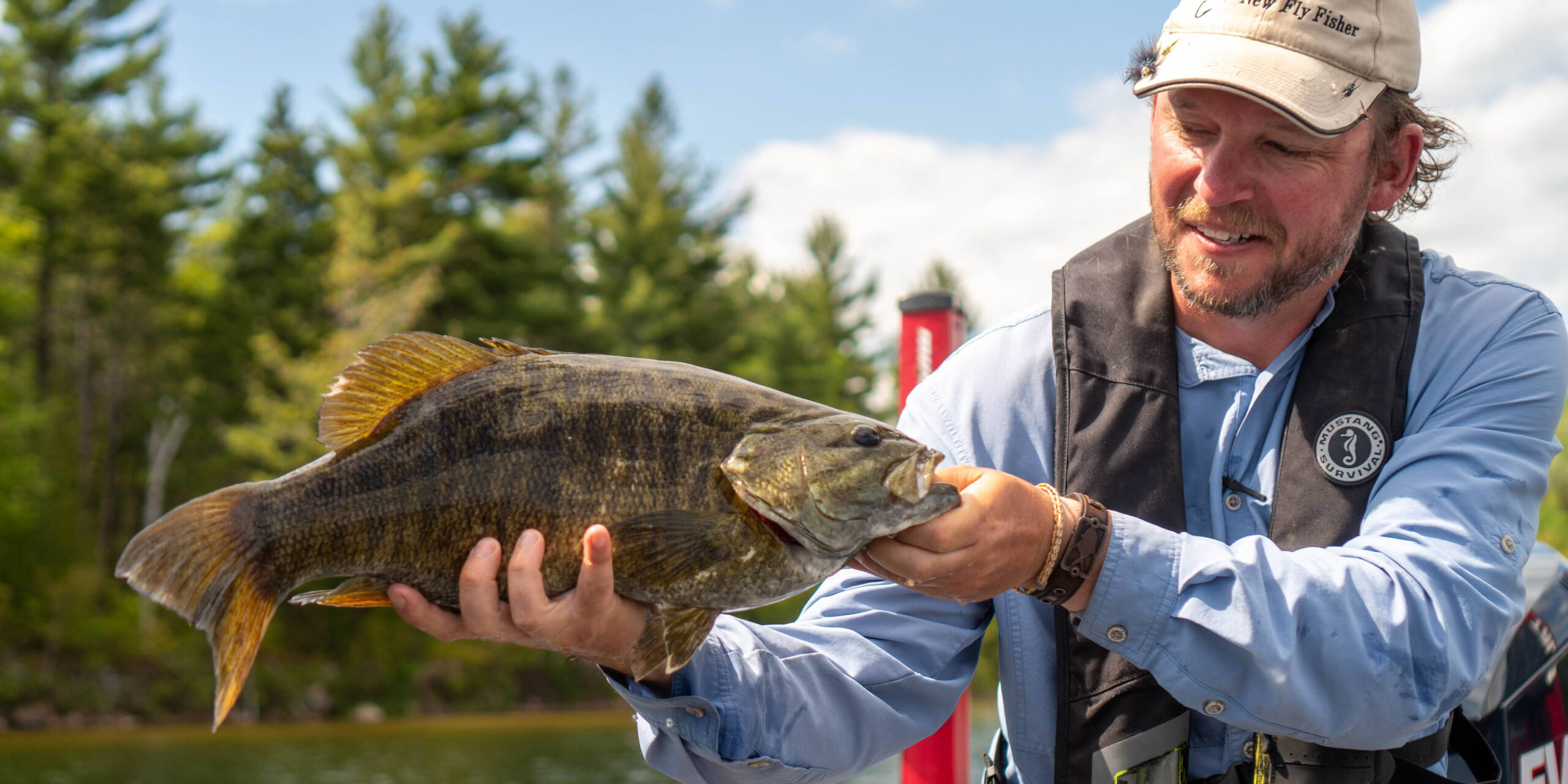 Spring Home Page - Man with Bass