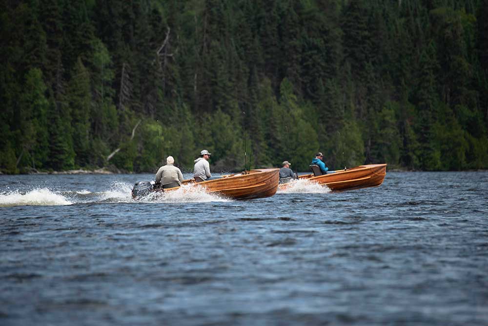 cedar strip boats with anglers