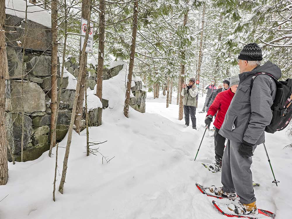 historic mine building covered in snow